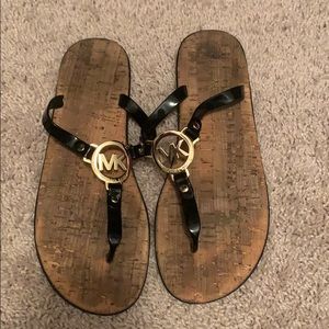 MK black flip flops!